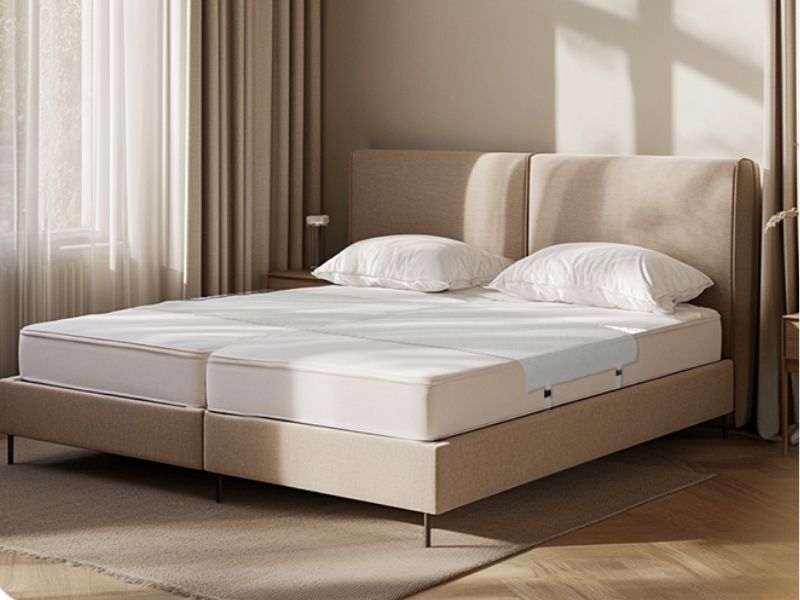 Bedbinder Deluxe installed between two mattresses on a boxspring, no gap visible